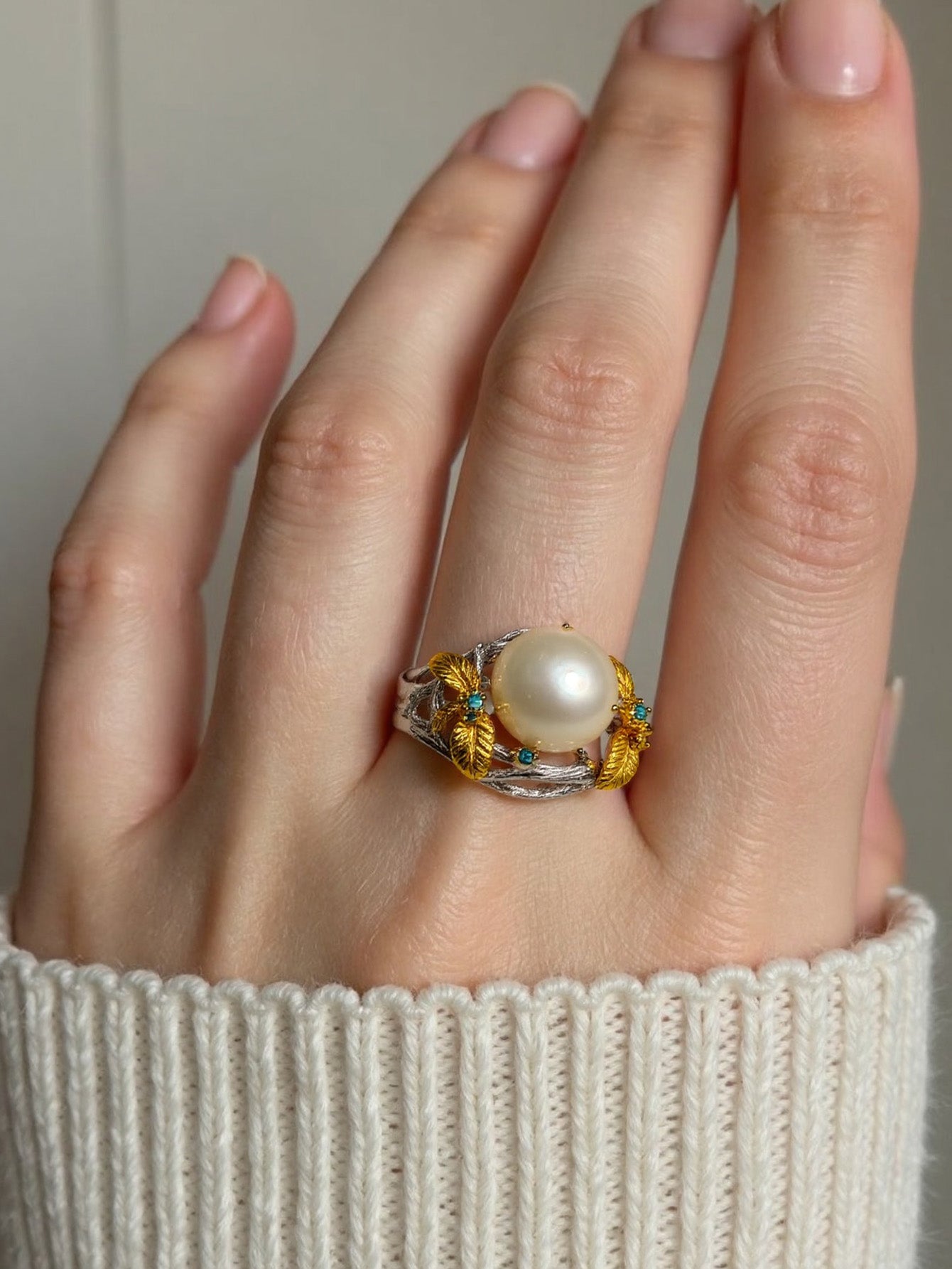 Pearl Nestled in Feather Blessing Ring