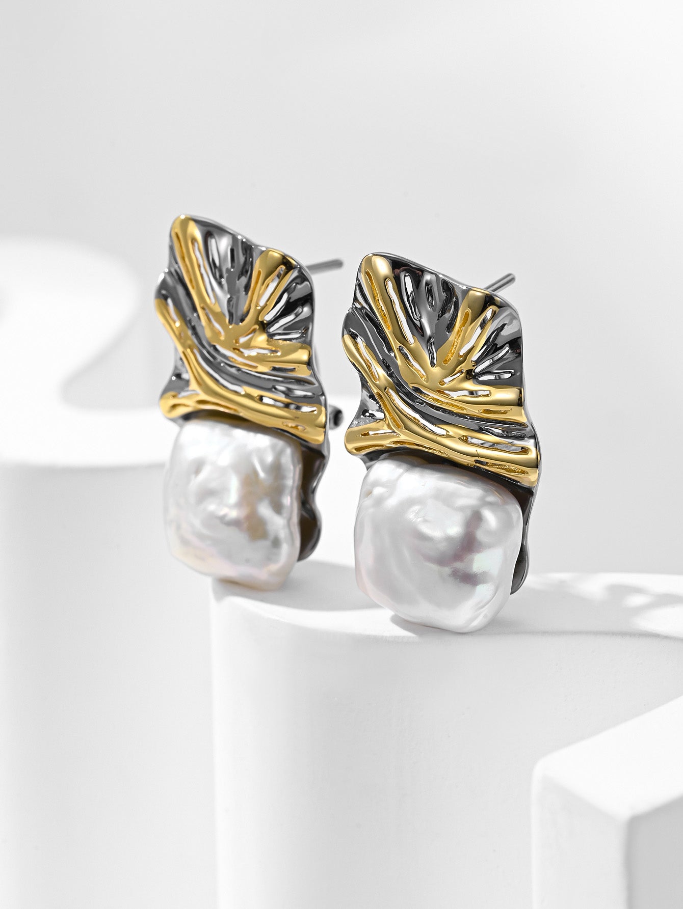 Uniquely designed natural pearl stud earrings