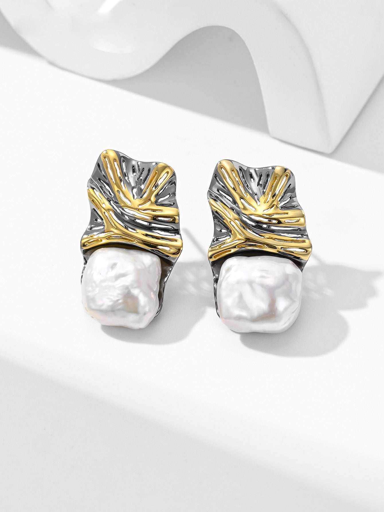 Uniquely designed natural pearl stud earrings