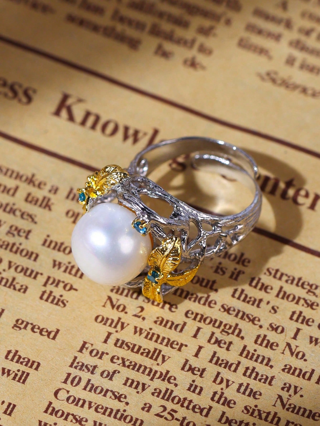 Pearl Nestled in Feather Blessing Ring