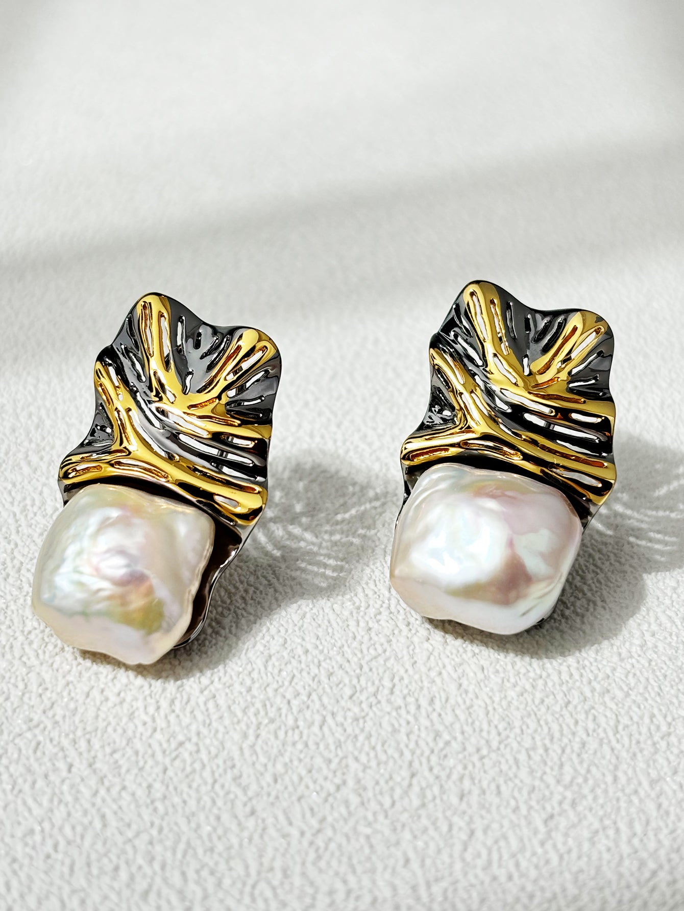 Uniquely designed natural pearl stud earrings
