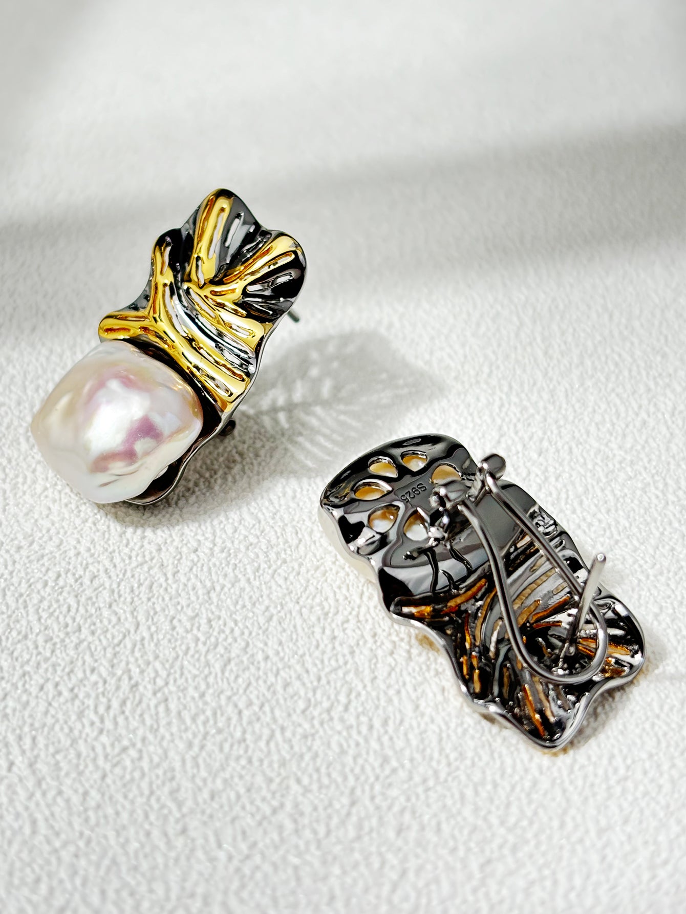 Uniquely designed natural pearl stud earrings