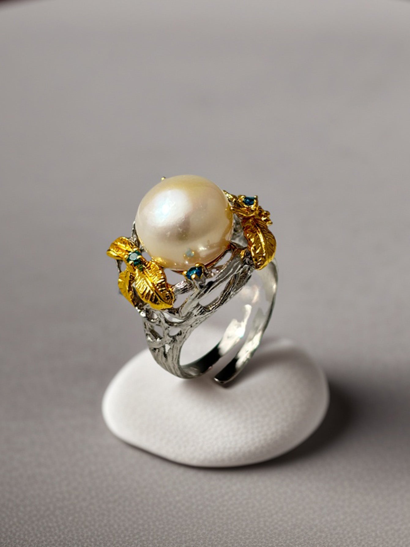 Pearl Nestled in Feather Blessing Ring